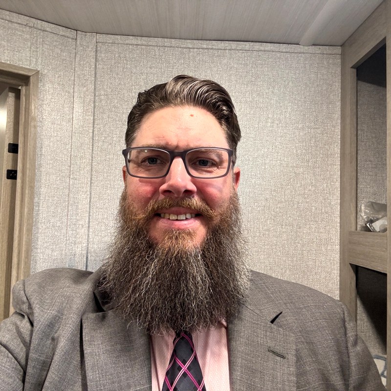 Jared — independent adjuster in suit and tie